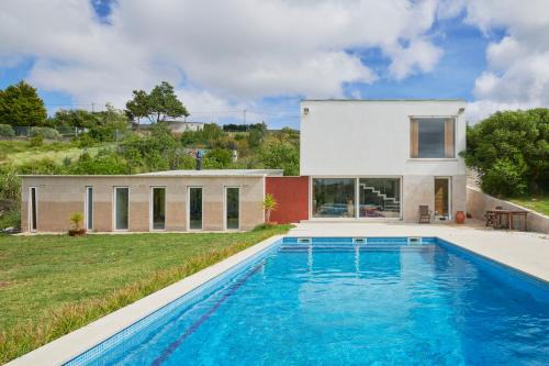 Arruda dos Pisoes House | Quinta TreeWindBee