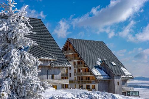 Besse-et-Saint-Anastaise Apartment | Résidence Goélia Les Chalets de Super-Besse