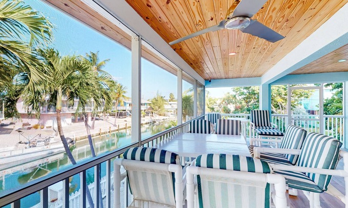 Islamorada House | Radiant waterfront retreat with remarkable views, patio, tennis court, & grill