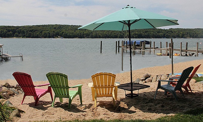 East Jordan Cottage | Rare Sandy Beach Lake Charlevoix Front Home -- Spacious Beach, Fishing, Shade