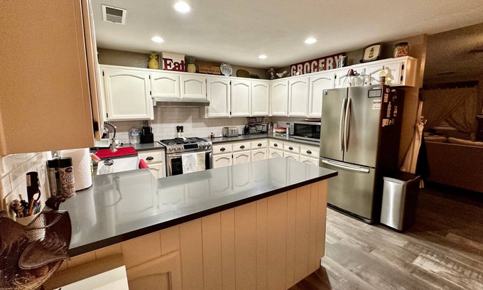 Exeter House | Relax in Exeter at a 2 bedroom 1 bath Oasis with a large covered patio and Pool