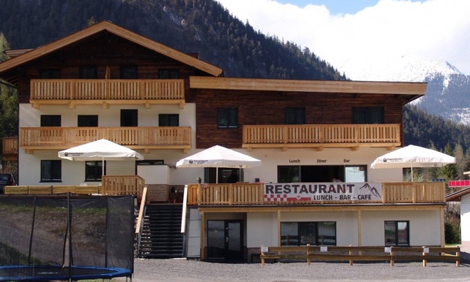 Biberwier Apartment | Relax wonderfully and into an apartment with a view of the slopes/mountains.