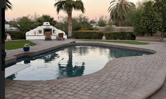 Glendale House | Resort backyard with heated pool