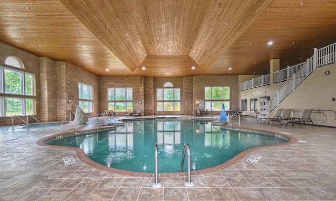 Pembine Hotel | Riverfront Escape! 2 Relaxing Units Near Trails! Pool, Gym & Free Parking!