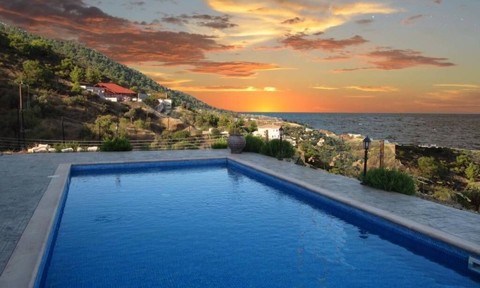 Pomos Villa | Romantic 3-bed villa w/fireplace & pool overlooking the Mediterranean