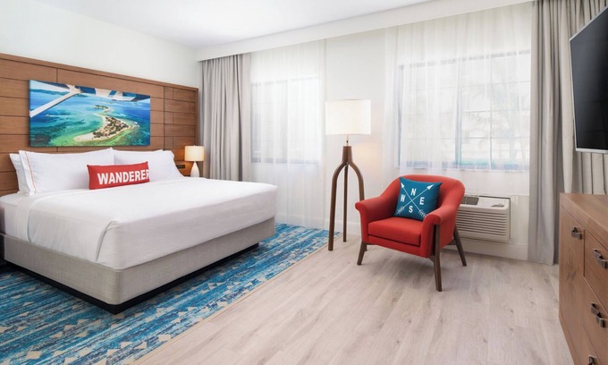 Park Shore Hotel | Romantic Couple Stay | Near Pristine Beaches | Outdoor Pool & Free Parking