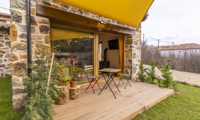 Casarejos Cottage | Romantic House, with Jacuzzi for two people in the room, wood-burning fireplace