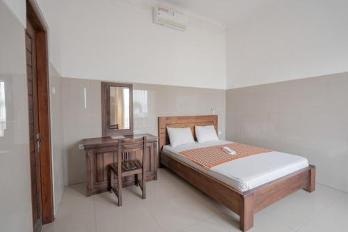 Temukus Hotel | Rommeo Inn Lovina Mitra RedDoorz