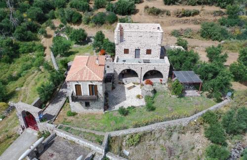 East Mani House | Rosso Antico Tower