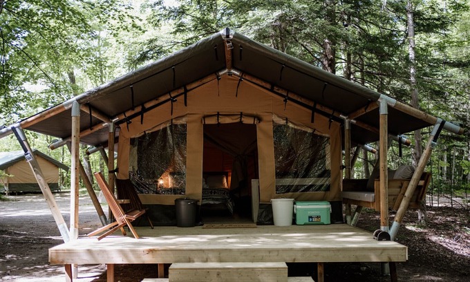 North Woodstock RV Rental | Safari Tent Site 10 | 1 Queen Bed & 1 Bunk Bed | Woods View