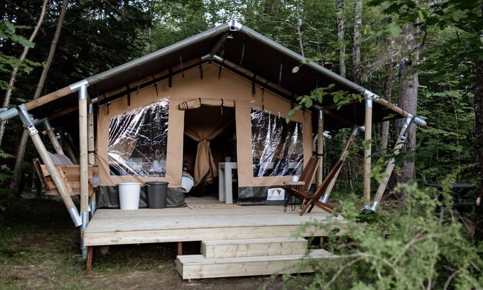 North Woodstock RV Rental | Safari Tent Site 8 | 1 Queen Bed & 2 Bunk Beds | Pond View