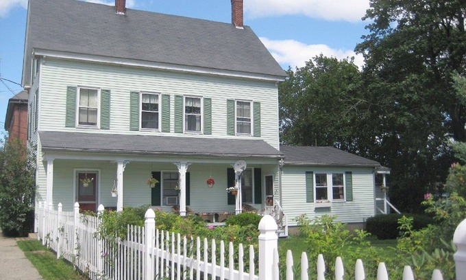 Wiscasset House | Sea breeze and summer flowers out on the deck