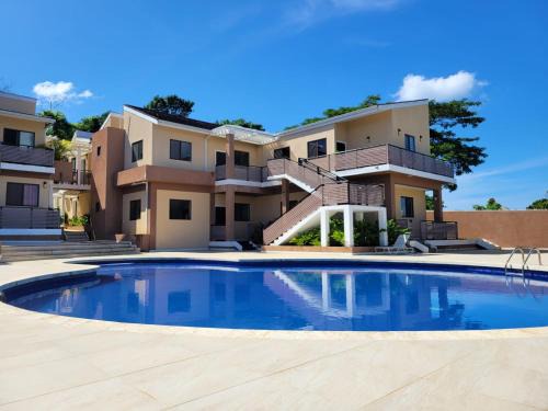 West End Apartment | Seaview Paradise - Sleeps 3 - Pool - Parking