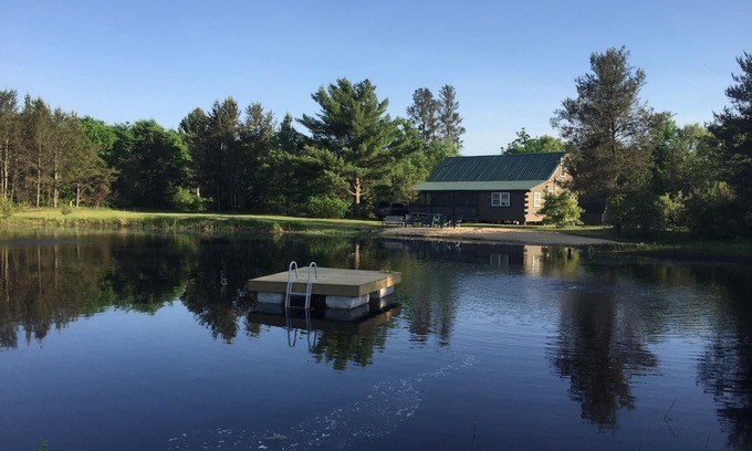 Sparta Cabin | Secluded family-friendly log cabin with swimming pond. Charm, comfort.