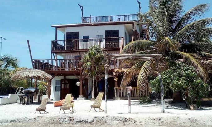 Caye Caulker House | Seculuded beachfront home, outdoor showers, rooftop deck, 360 island view