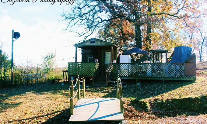 Mena Cabin | Shady Cabana cabin or Tiny home nestled in the valley between 3 beautiful ponds!