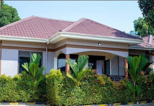 Entebbe Bed & Breakfast | Shammah Palm Cottages