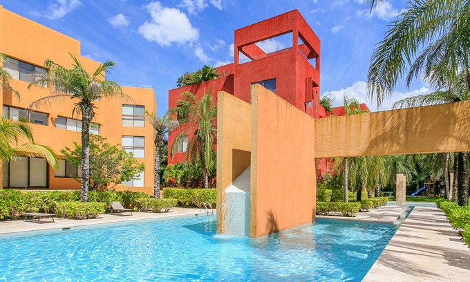 Playacar Fase II Condo | Sian Kaan by Stella Rentals