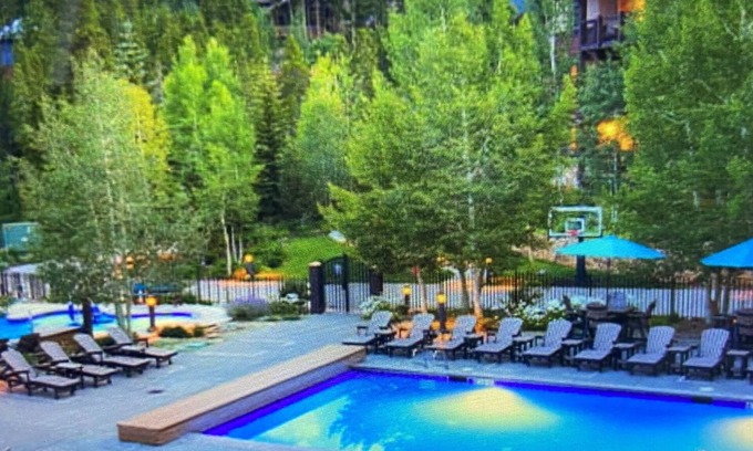 Four O'Clock Resort | Ski on/off the slopes of Breckenridge, CO from the Grand Timber Lodge Resort! n