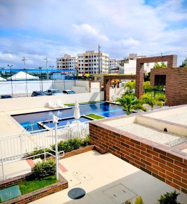 Aruanda Apartment | Sol Prime Aracaju - Varanda - 2 quartos com ar - vista piscina - a 6 minutos da praia de Aruana