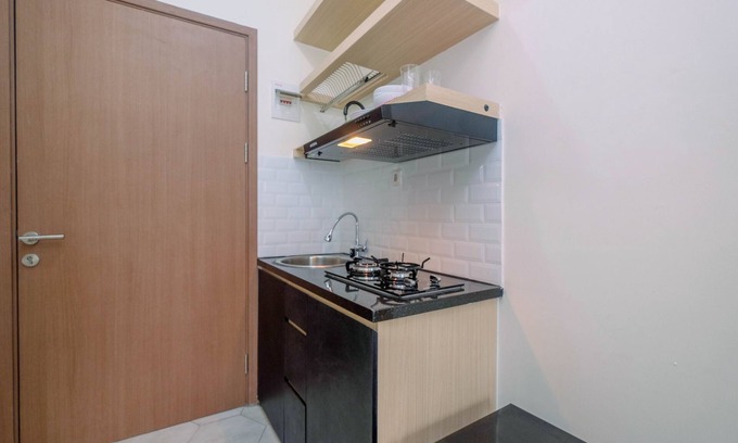 Pancawati Apartment | Sophisticated Studio Room At Podomoro Golf View Apartment By Travelio