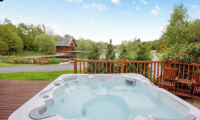 Menai Bridge Ski Chalet | Spacious, light, all wood luxury lodge in tranquil location at head of lake.