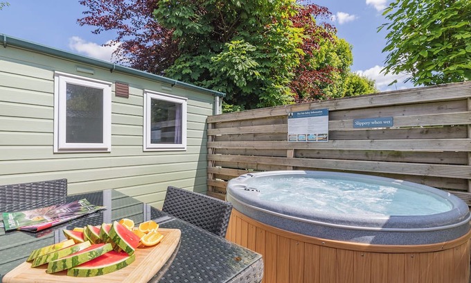 Longnor House | Spacious modern one-bedroom caravan exclusively for two adults with hot tub.