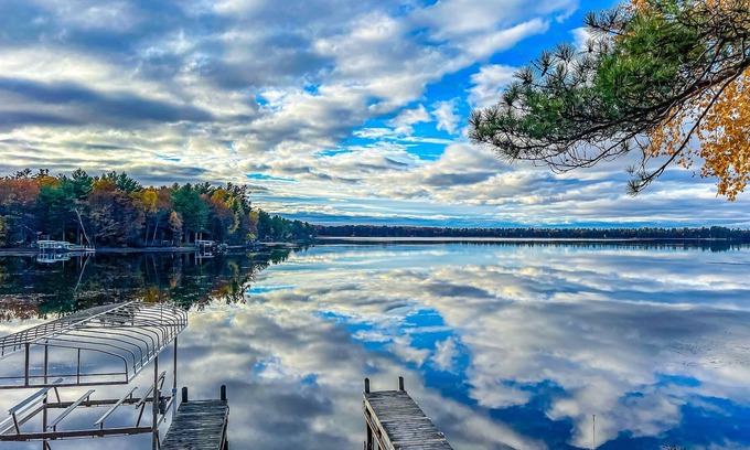 Manitowish Waters House | Spacious & peaceful lakefront villa & guest house with fire pit, patio, & views
