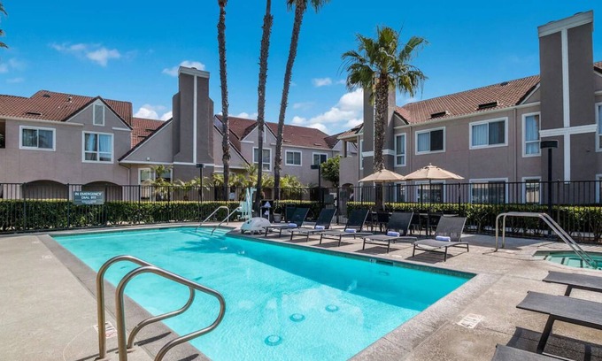 Downtown Village House | Spacious Three 2BR Units w/ Kitchens! w/ Onsite Pool, BBQ & Sports Facility!