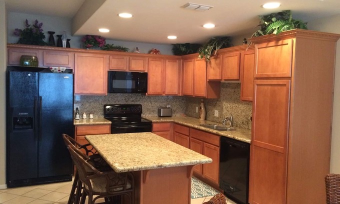 Laguna Vista House | SPI Golf Resort Getaway Overlooking The Harbor With Pier And Private Boat Lift