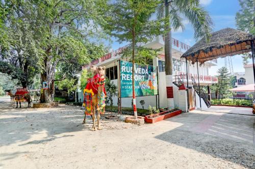 Ramnagar Hotel | Staybook The Rudveda Resort - Free High Tea near Pool Area