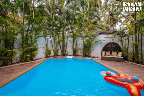 Nagoa Villa | StayVista at Summer Days with Pvt Pool & Alfresco Dining