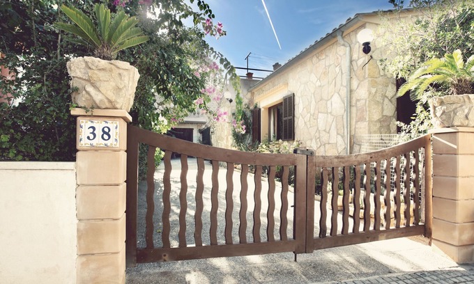 Colonia de Sant Pere Apartment | Stone duplex with garden and air conditioning