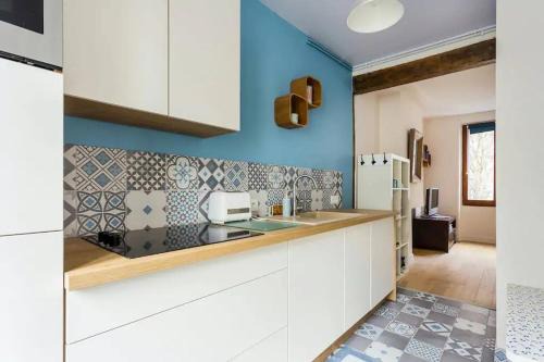 Combat Apartment | Studio Paris buttes Chaumont