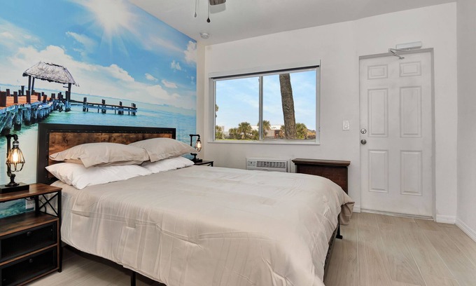 Daytona Beach Shores Hotel | Studio suite Queen bed kitchen walk in shower #5