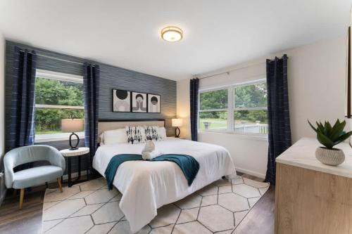 East Stroudsburg House | Stunning 4BR 4BA Luxury Home with Hot Tub Game Room & Fire Pit Sleeps 12