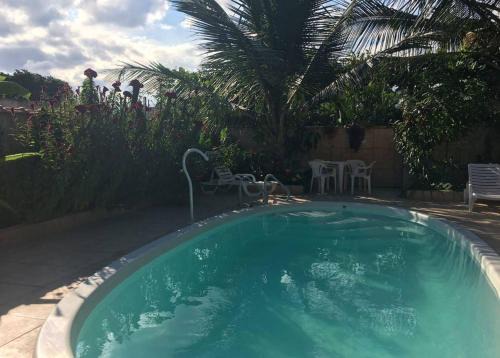 Bairro da Enseada House | Suíte 8 com piscina e wi-fi em Caraguatatuba