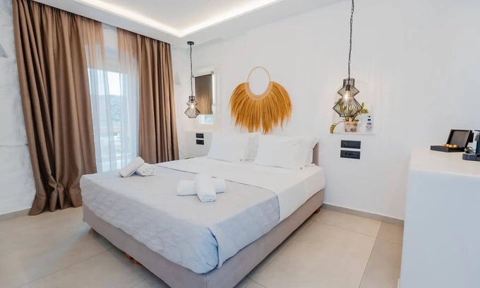 Mykonos Apartment | Suite with King size bed and pool view