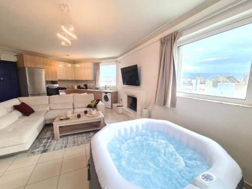 Peristeri Apartment | Sunny Home Private Jacuzzi Hydromassage, Fireplace, Acropolis & Lycabettus View, Underground Parking, 300m Metro Peristeri