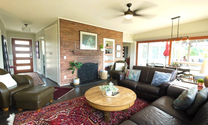 Des Moines House | Sunsets Over the Sound Mid-century modern view property blocks from the Marina!