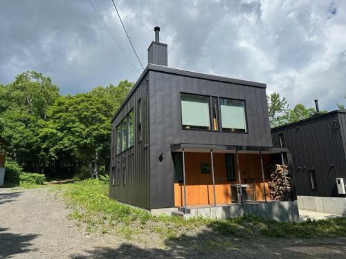 Rusutsu House | Tanuki House with air conditioner - walk to Rusutsu Resort