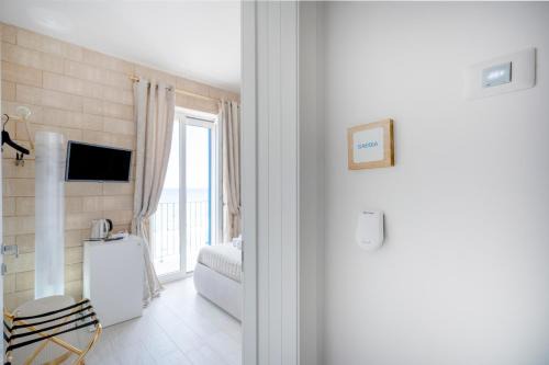 Polignano a Mare Apartment | Terra | 2-Bedroom with Shared Kitchen & Balcony – Seafront Location