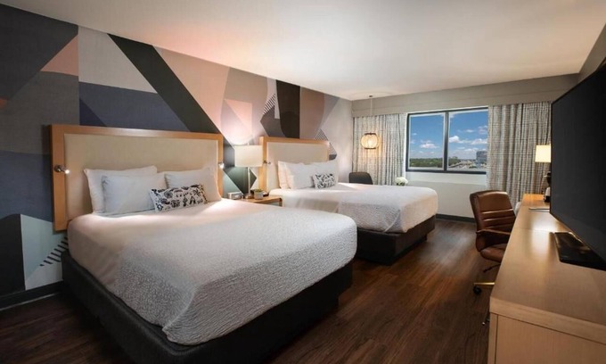 Northeast Dallas Apartment | The Beeman Hotel includes an indoor swimming pool. Dallas Love Field airport .