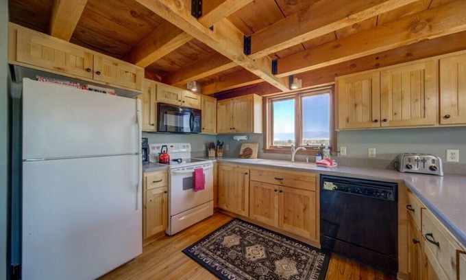 Shining Mountains House | The Madison River Overlook Cabin