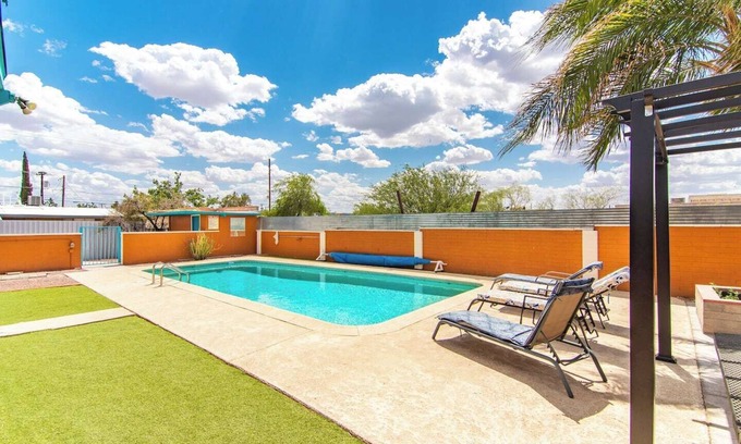 The Garden District Apartment | This centrally located 3 bedroom 2 bathroom features a full size pool and electric vehicle charging on site.