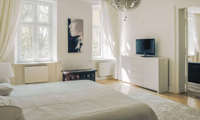 Gizycko Apartment | This large, modern vacation apartment is located in a renovated residential building.