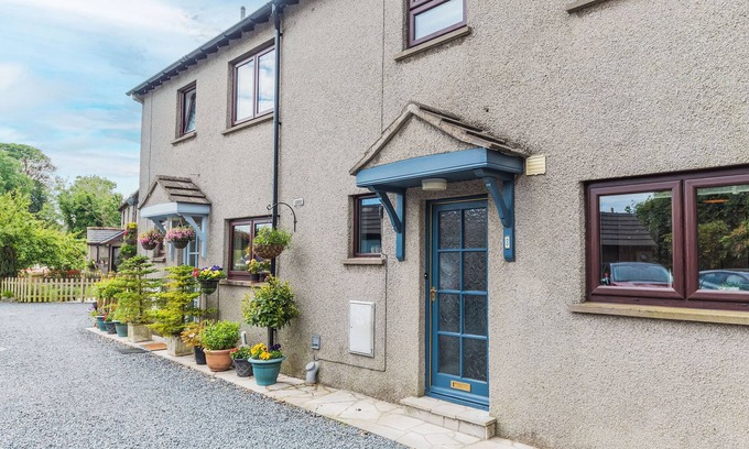 Cark Cottage | This warm and welcoming cottage, with a homely feel, has a balcony where you can watch ducks go by.