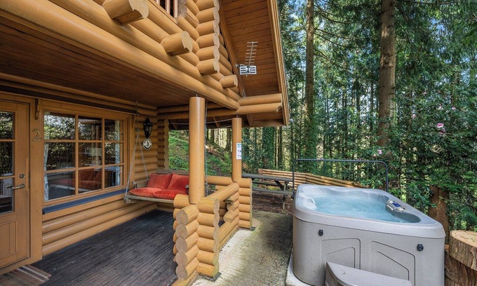 Westleigh Ski Chalet | Timber lodge set in an elevated position with views of the lake.