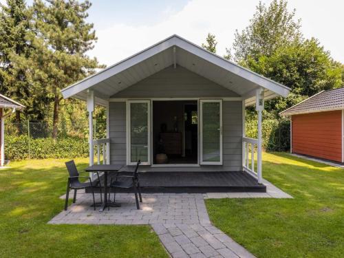 Oirschot Ski Chalet | Tiny House in Brabant with Cozy Terrace