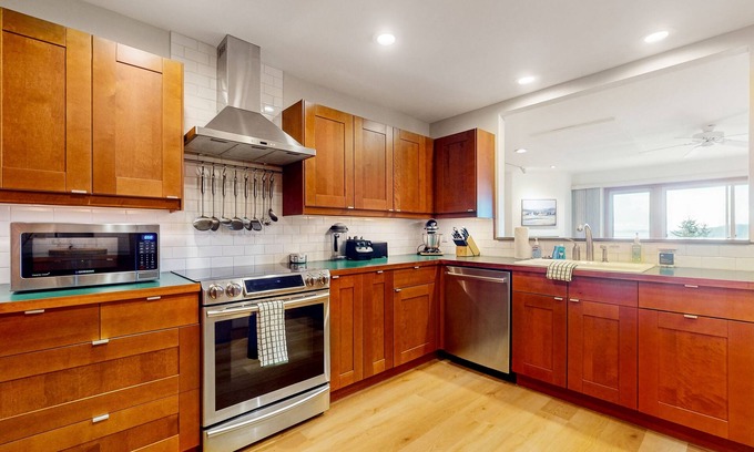 Rosario Condo | Top-floor condo with amazing water views, two decks, & fireplace